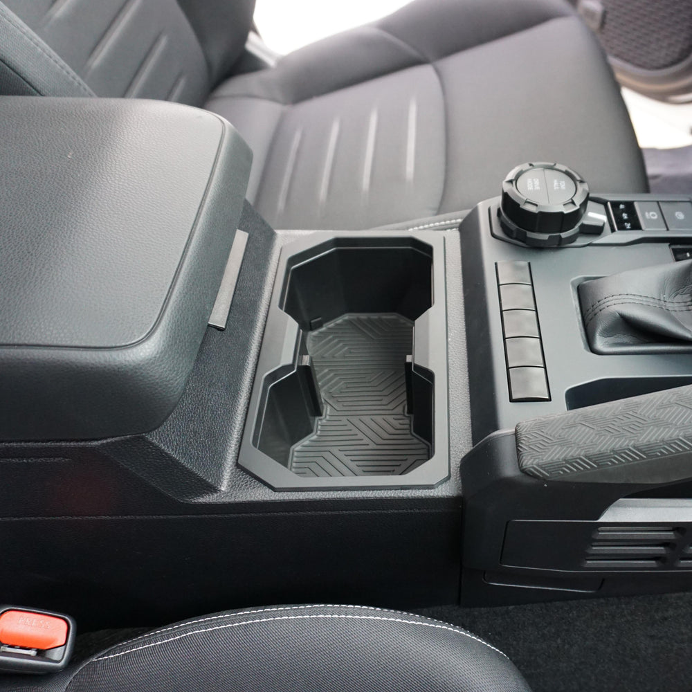 AJT Design oversized cup holder in a 4Runner console, passenger side view