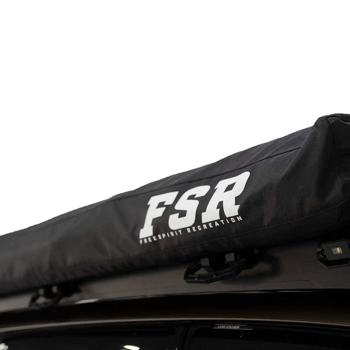 Freespirit Recreation 180 degree awning V2 mounted on a Toyota