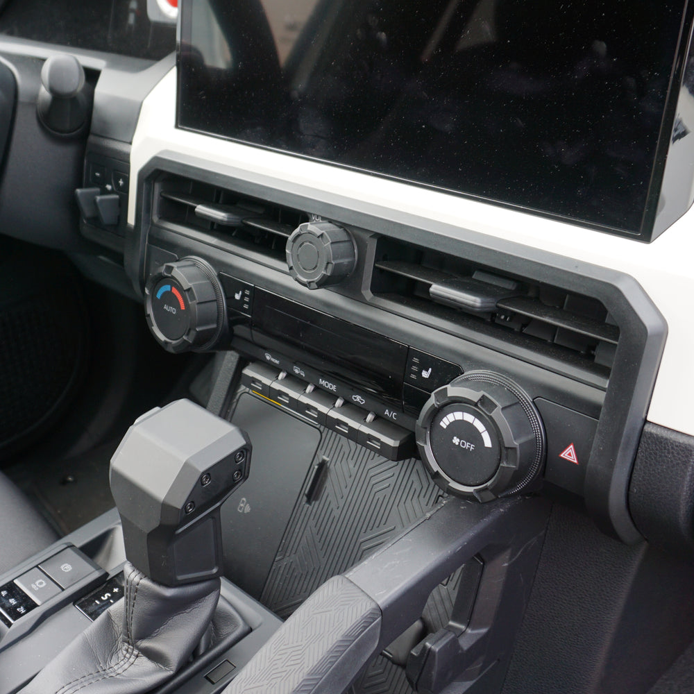 Toyota Tacoma interior with AJT Design toggle covers installed