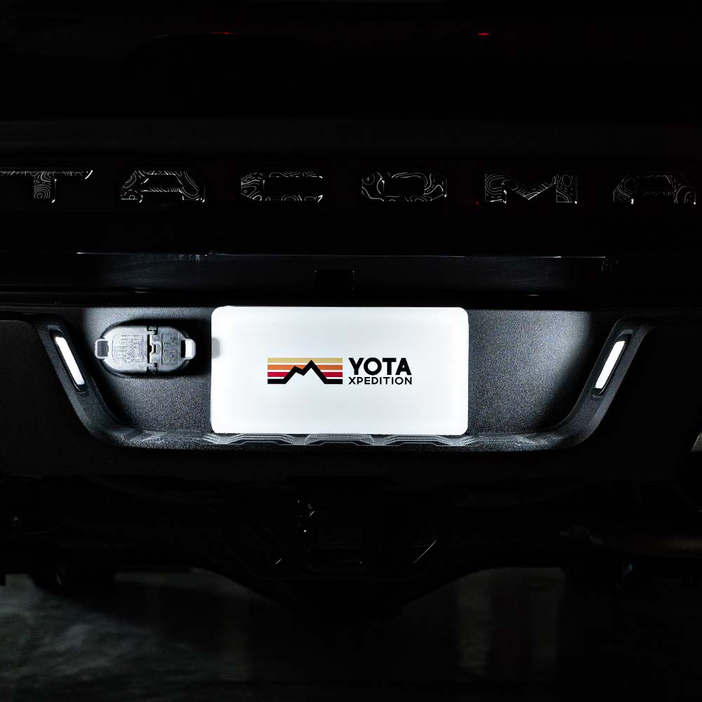 2018 tacoma license plate 2024 light