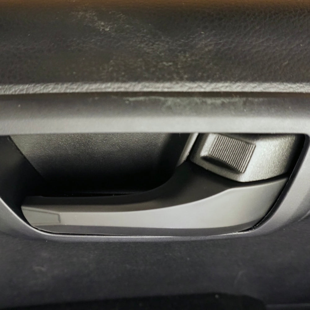 Close up of the door handle cover fit on a Tacoma handle
