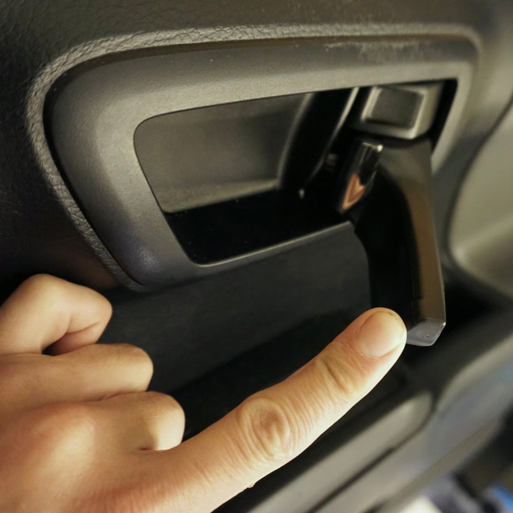 Snapping a door handle cover onto a Tacoma door handle
