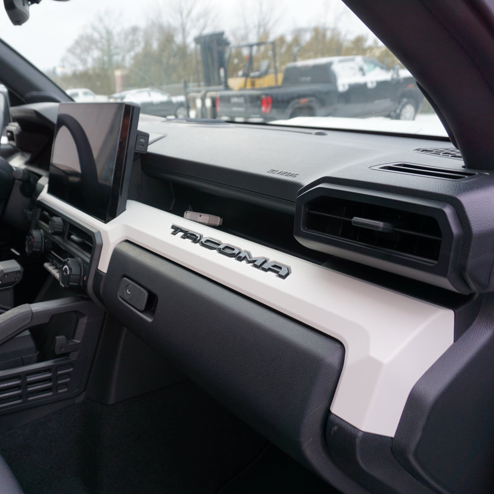 Passenger side view of AJT Design vent trim installed in a 2024+ Toyota Tacoma