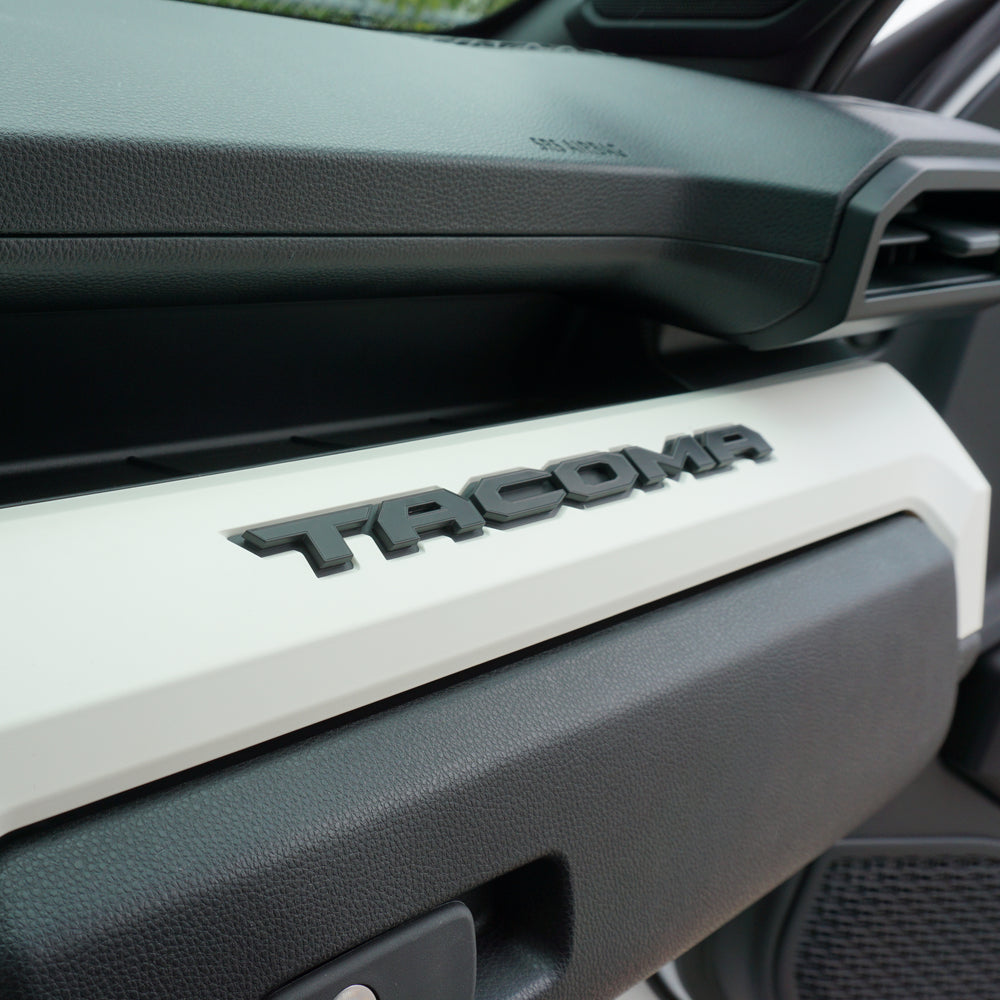 Glovebox letters on the passenger dash of a Tacoma, wide view