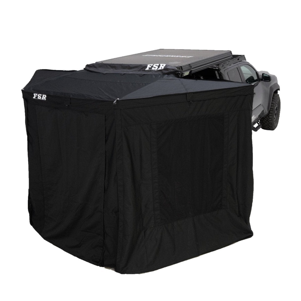 Freespirit Recreation 180 Tailgate Awning 96-inch sidewalls attached to a Toyota truck camp setup