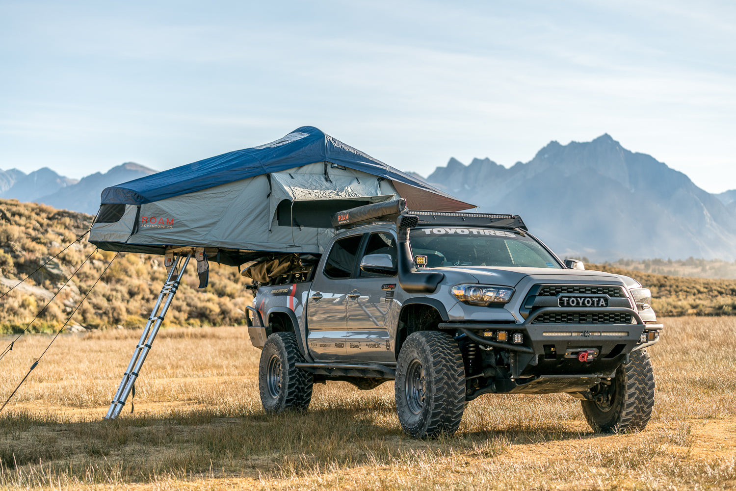 Vagabond Rooftop Tent in Slate Grey Navy Blue shown on Toyota Tacoma